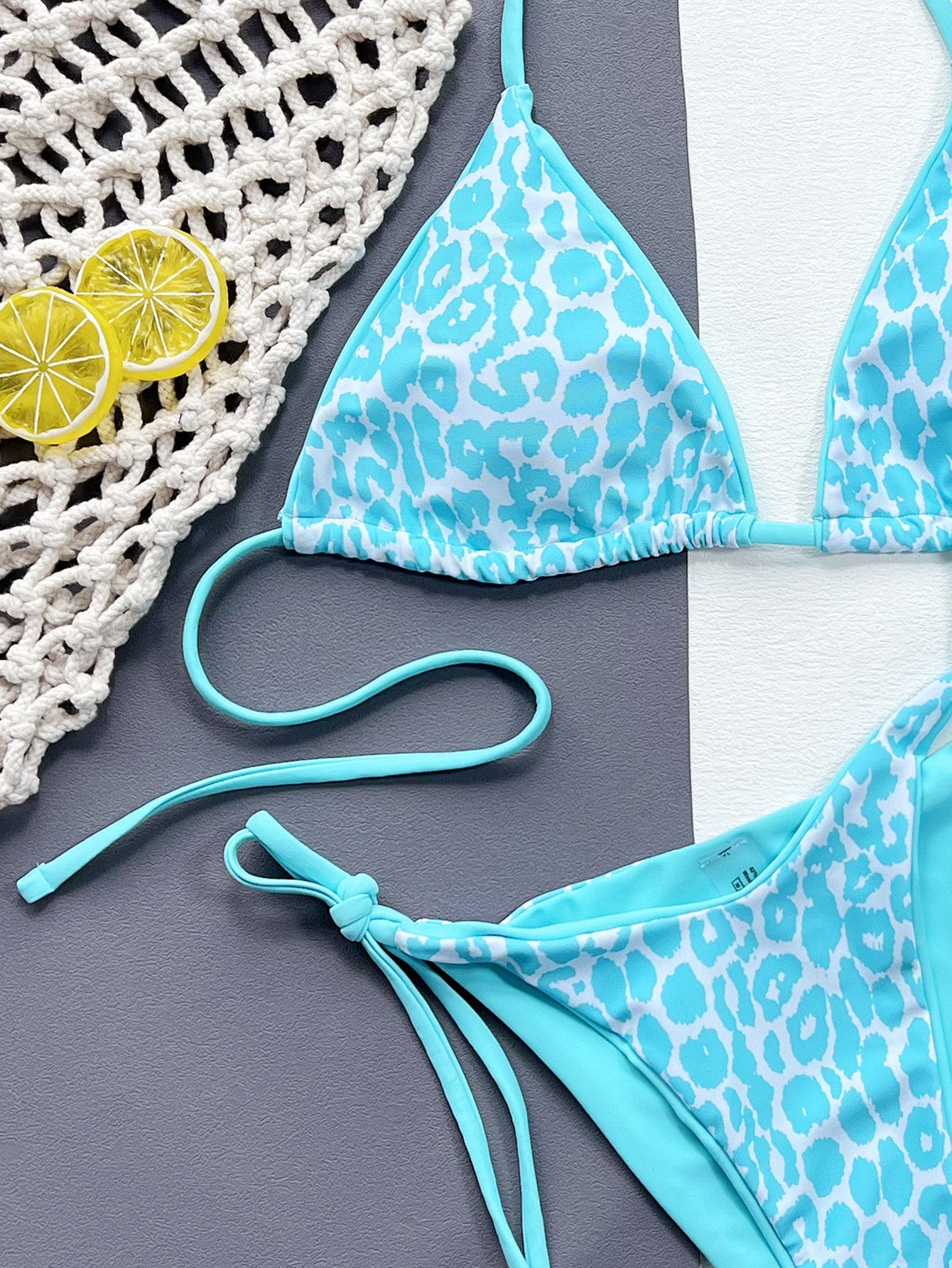 Leopard print bikini in aqua detail view - Red Desired swimwear