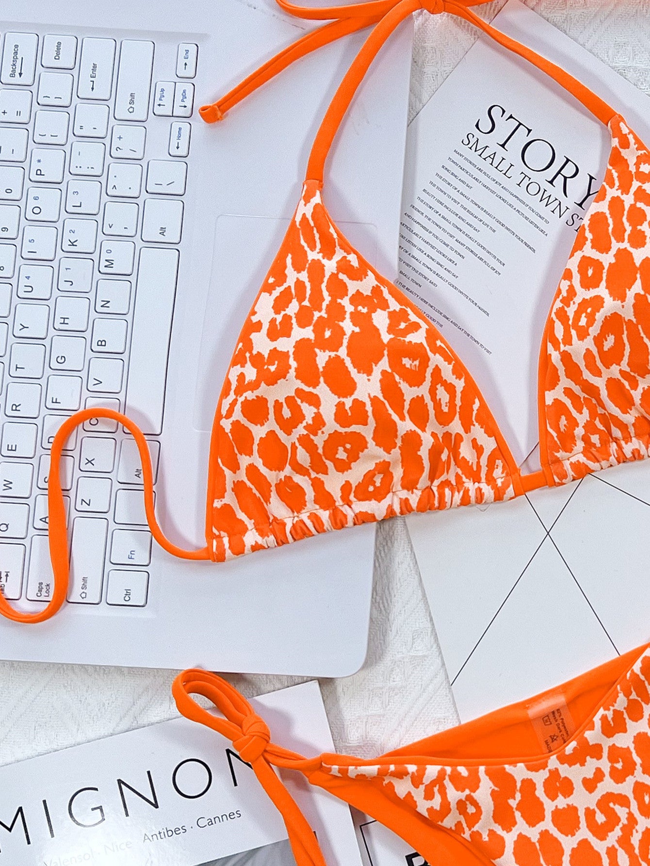 Leopard print bikini in tangerine detail view - Red Desired swimwear