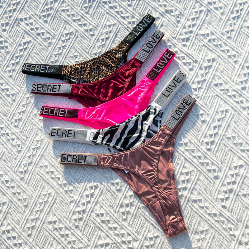 Invisible Low‑Rise Thong Panties – assorted colors, flat lay view